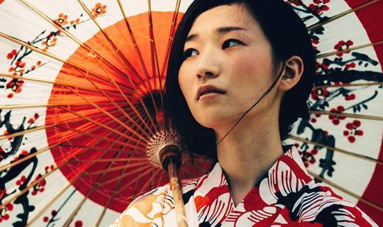 Japanese woman with decorated oil-paper umbrella