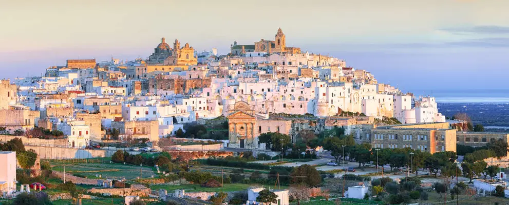 Ostuni white town skyline and Madonna della Grata church