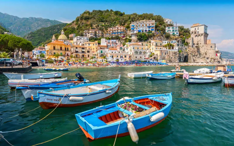 Boats and traditional buildings in Cetara harbor