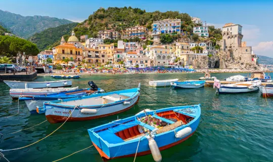 Boats and traditional buildings in Cetara harbor