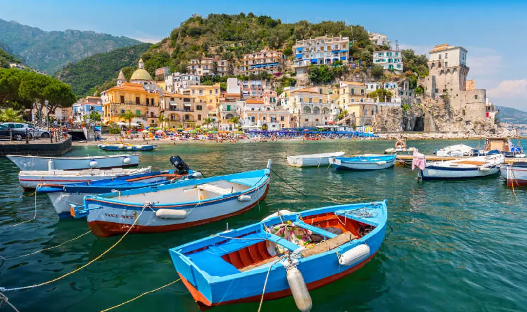 Boats and traditional buildings in Cetara harbor